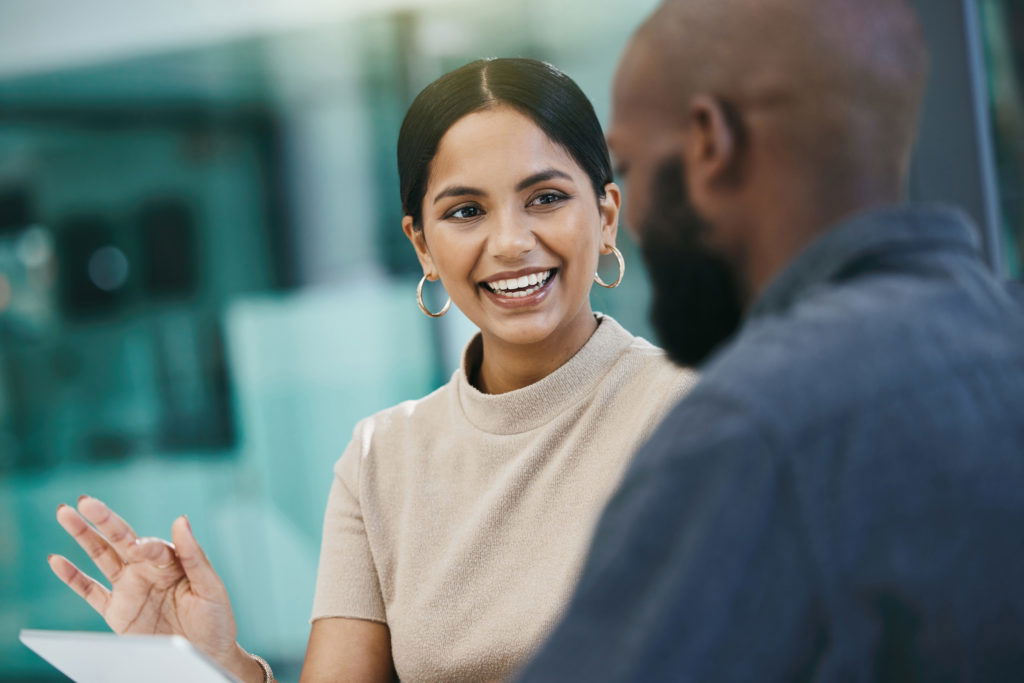 Bilingual lawyer meeting with a client