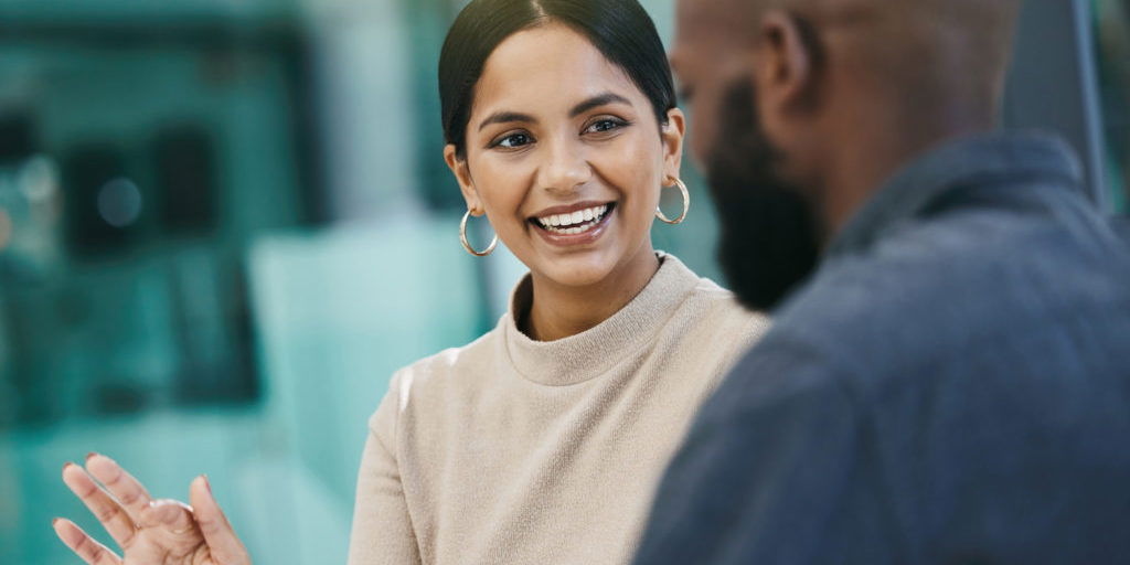 Bilingual lawyer meeting with a client