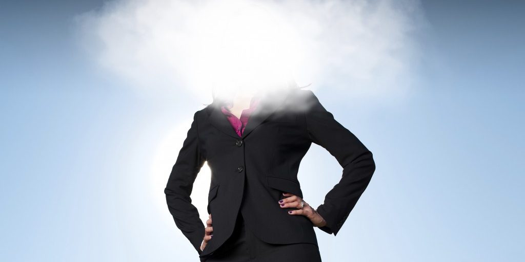 A business women with her head in the clouds.